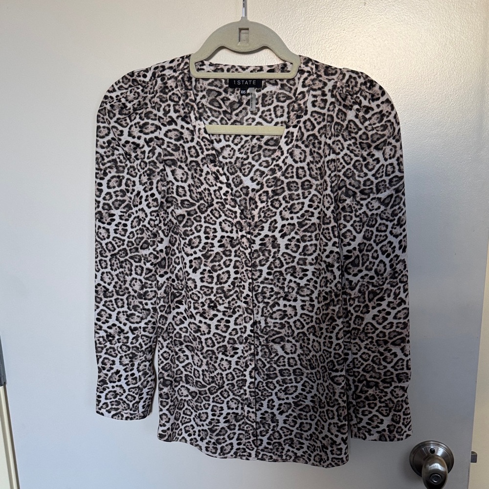 1. State leopard print top